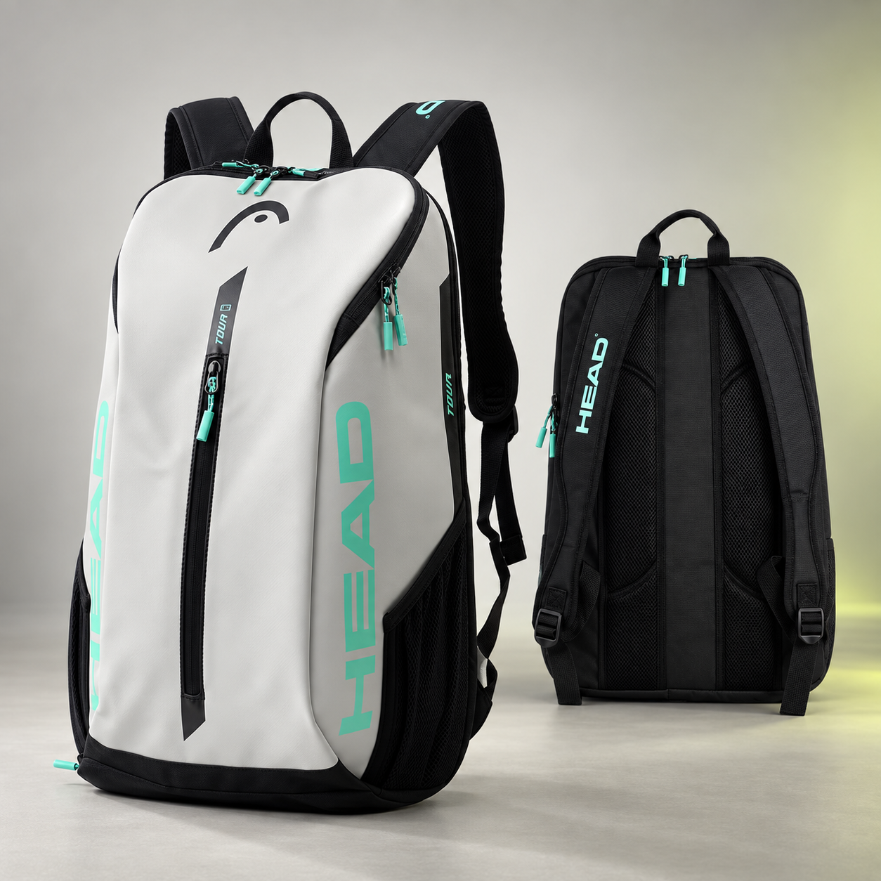 HEAD Tour 25L white, black and teal racquet backpack with dedicated shoe and equipment compartments.